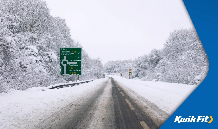 An empty road after heavy snow � a lot appears to have melted and refrozen into icy slush.