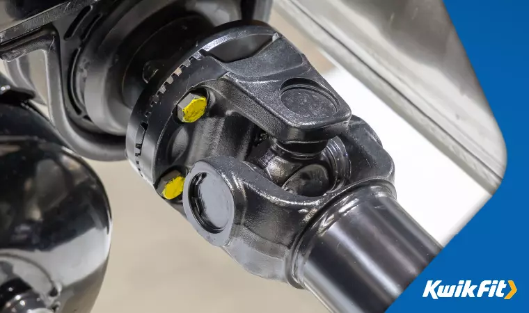 Universal joint on a car's drive shaft � used to transmit rotational power while being able to account for relative movement along the shaft.